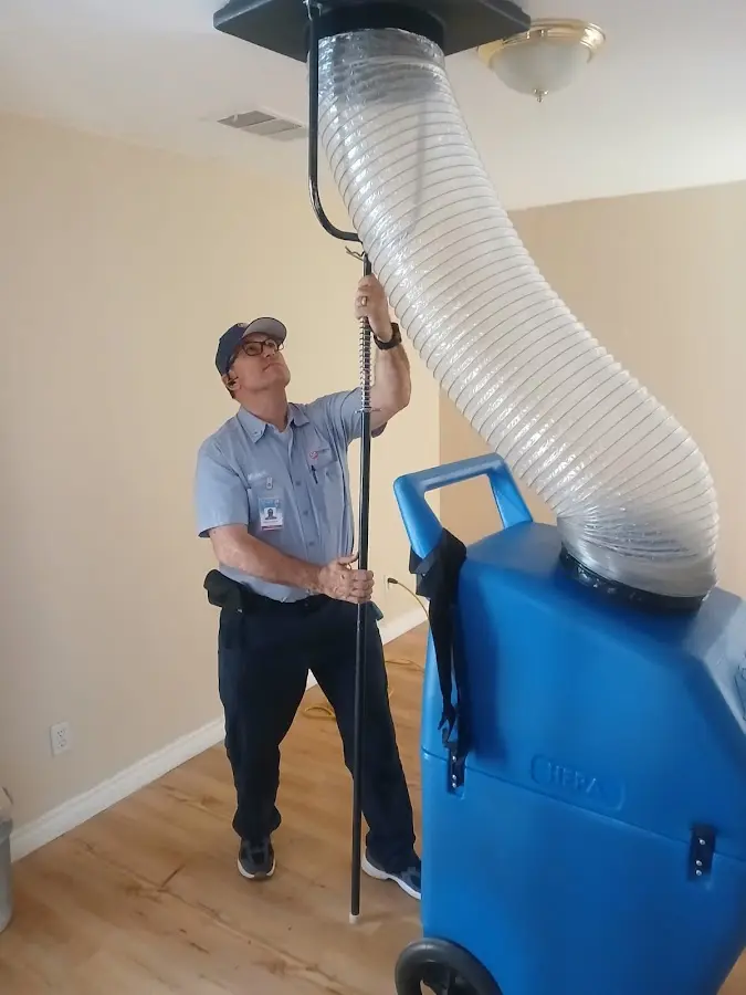 HVAC Installation technician using HEPA equipment in Tichigan